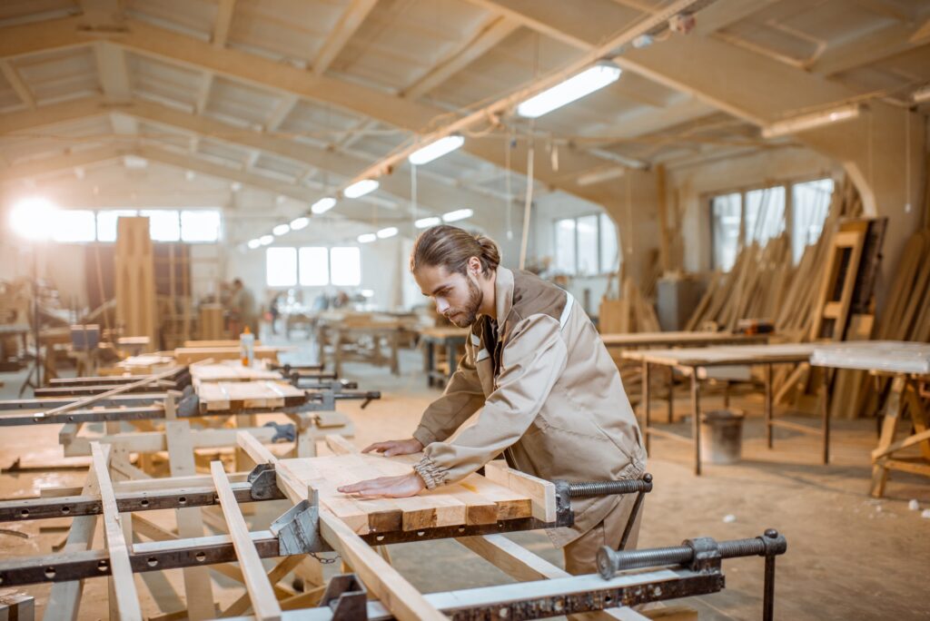 carpenter working at the carpentry manufacturing